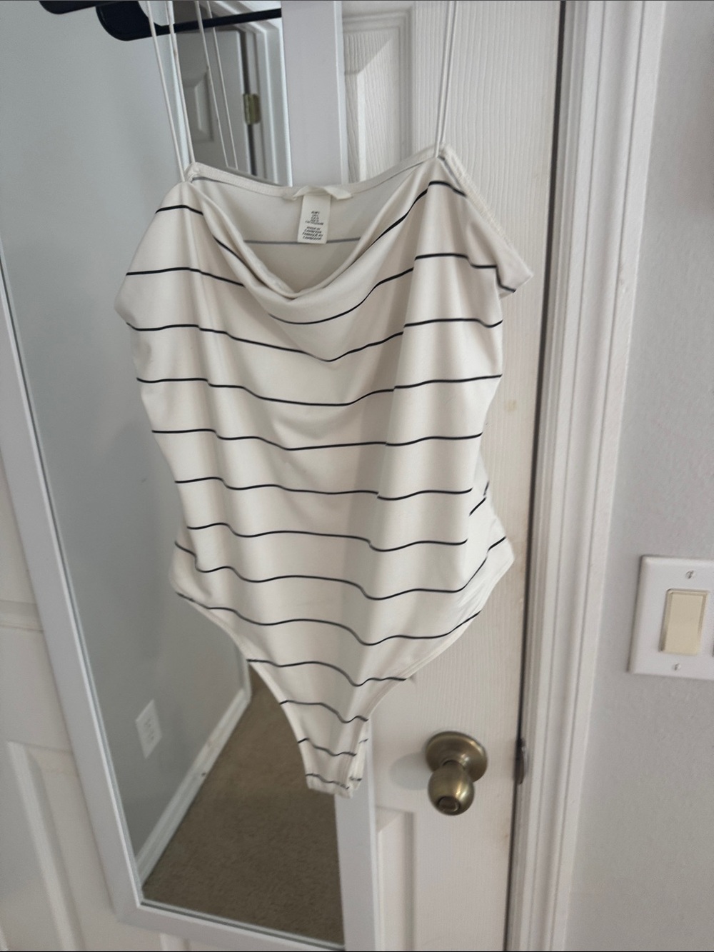 Woman’s striped bodysuit with straps